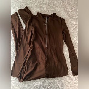 Dark brown zip up long sleeve jumpsuit size large
